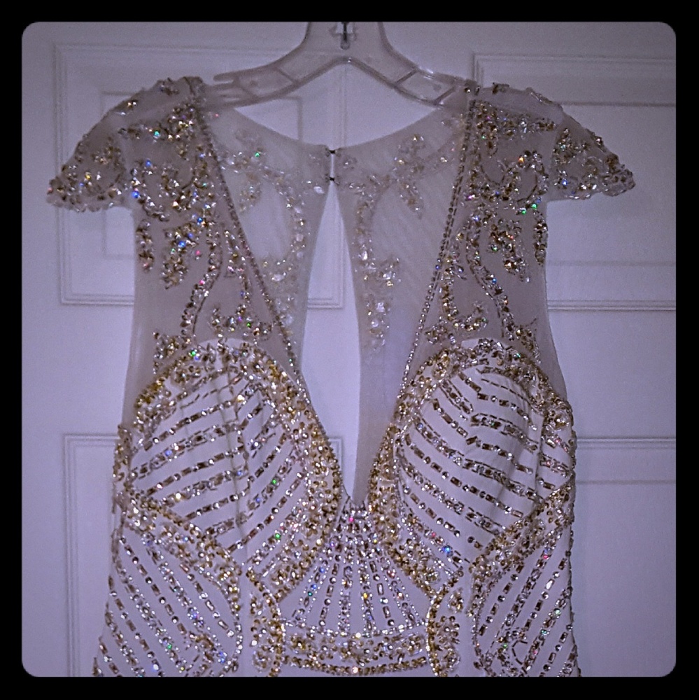 Unique vintage, white gown with gold details